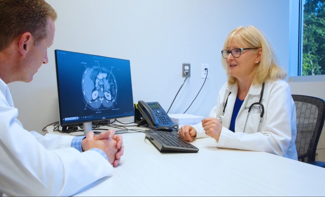 Two doctors discussing a CT scan.